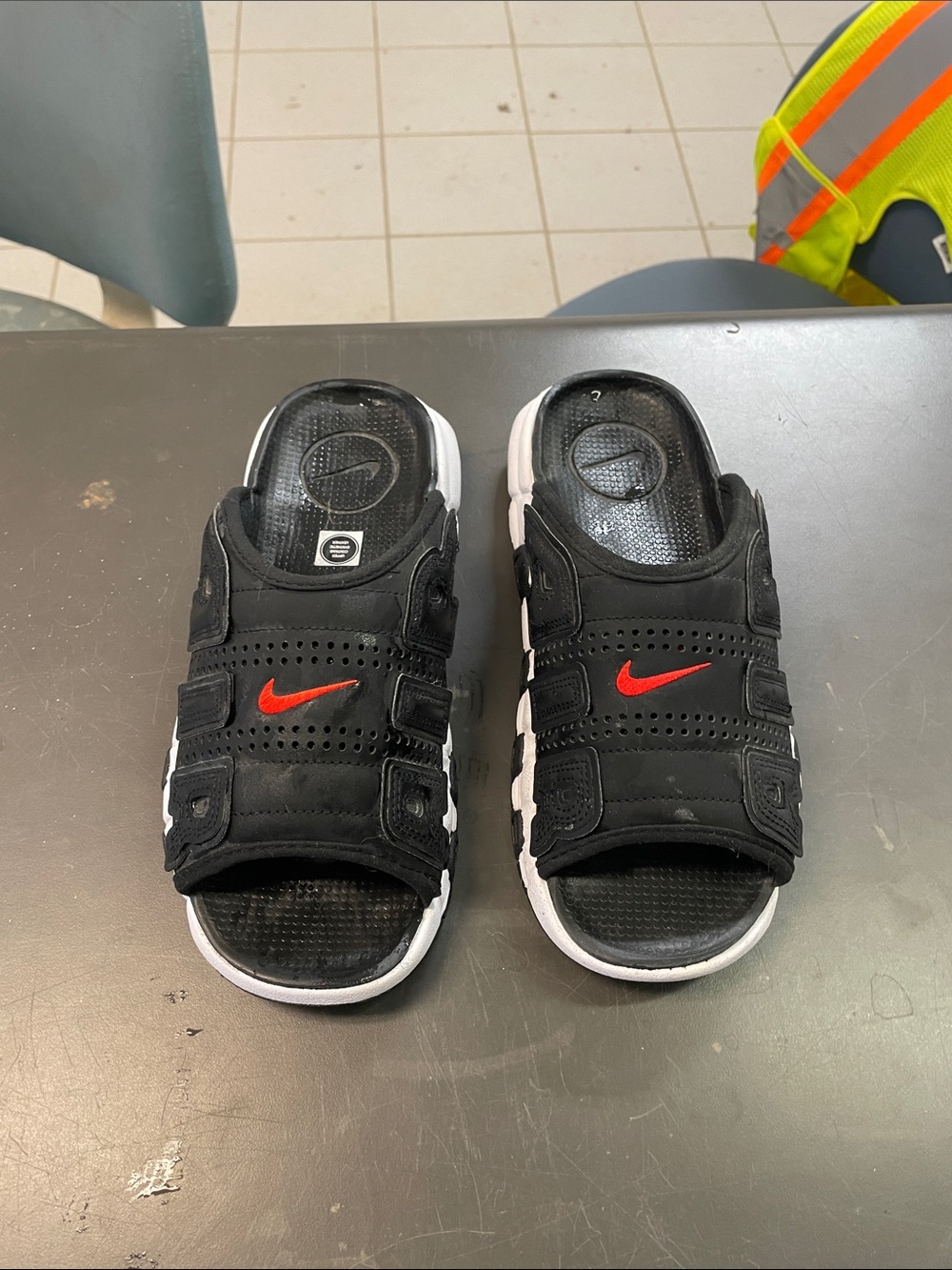 Nike Kids Black Slide Sandals with Red Swoosh